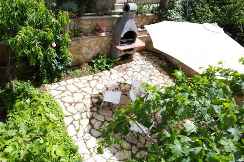 Jardín al aire libre en Lapad House