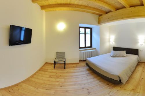 Cama o camas de una habitación en Hotel Albrici