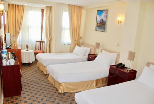 Katil atau katil-katil dalam bilik di Hotel Historia-Special Category