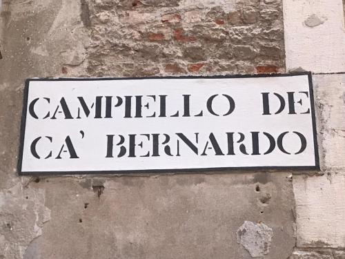 a street sign on the side of a building at Ca' Bernarda in Venice
