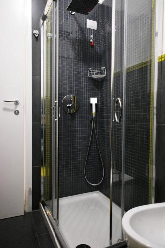 a bathroom with a shower and a sink at I Colori di Mag in La Spezia