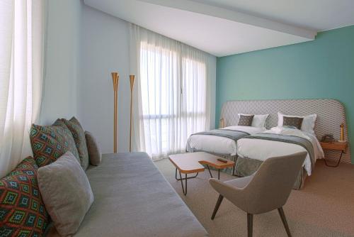 Katil atau katil-katil dalam bilik di Kyriad Residence Casablanca