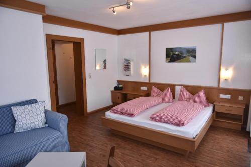 Cama o camas de una habitación en Alphotel Mittersill