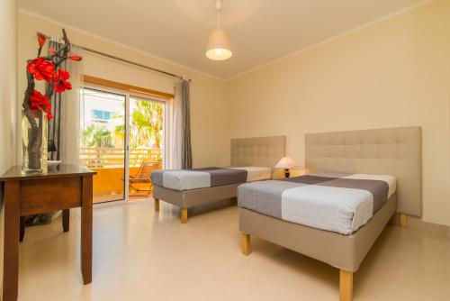 En eller flere senge i et værelse på Royal Cabanas Golf by Algartur