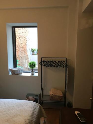 Ένα ή περισσότερα κρεβάτια σε δωμάτιο στο The Garden Apartment, The Willow Apartment, & The Tropical Apartment at Casa of Essence in Old San Juan