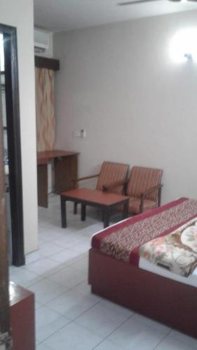 Un lugar para sentarse en Pamposh Guest House GK II Market