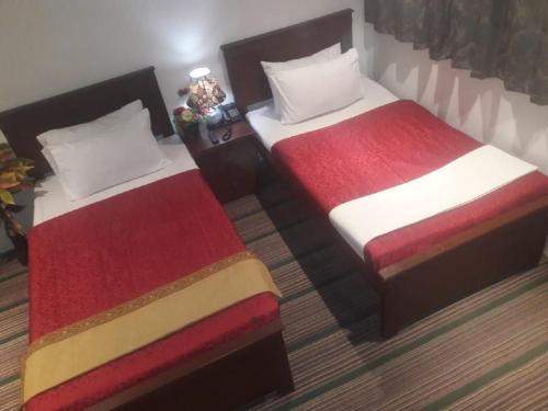 Cama o camas de una habitación en BnB Hotel