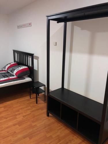 a bedroom with a bunk bed and a mirror at Apartment 4 Rent in Bochum