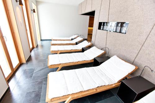 a row of hospital beds in a room at Ferienpension Senfter in Innervillgraten