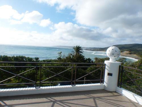 a view of the ocean from a balcony at La View 麗晨 Homestay in Manzhou