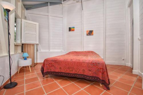 Postel nebo postele na pokoji v ubytování Villa du Cap Beauchene