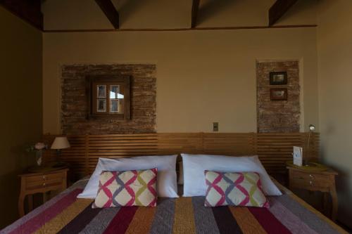 Säng eller sängar i ett rum på Cinque Colori Bed & Breakfast- Spa
