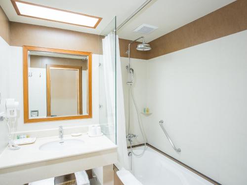 Koupelna v ubytování Jiuwu Hotel