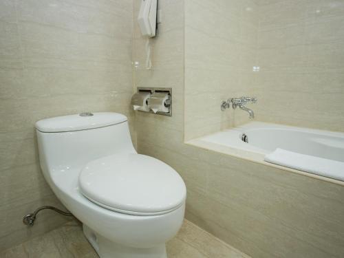 Koupelna v ubytování Jiuwu Hotel