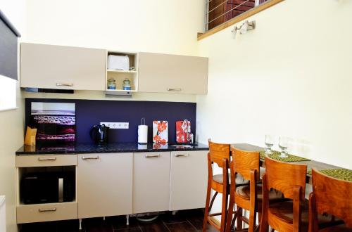Köök või kööginurk majutusasutuses Embrace Hotel & Apartments