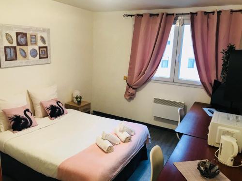 Postel nebo postele na pokoji v ubytování Neoresid - Résidence Saint Marc