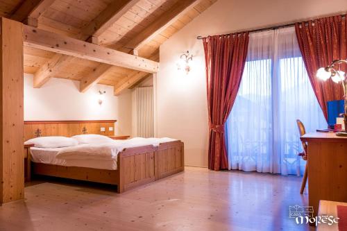 Llit o llits en una habitació de Casa Moresc