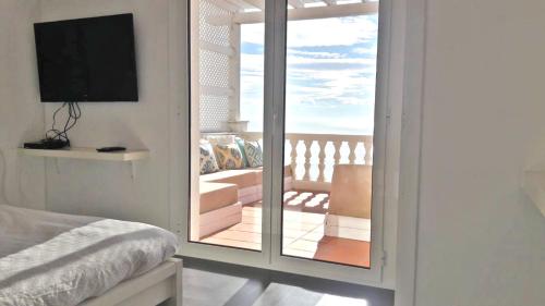 Posteľ alebo postele v izbe v ubytovaní Amazing seaview apartment with terrace & parking - Casa ArteVida