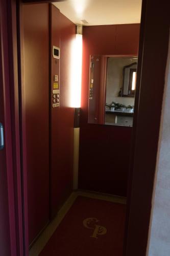 a small room with a light on the wall at Agriturismo Corte Palazzo in Marcaria