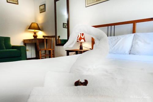Katil atau katil-katil dalam bilik di Locanda Della Biscia
