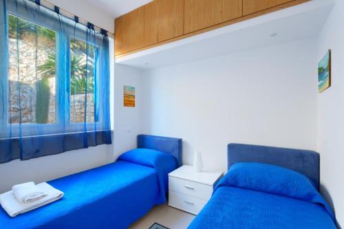 Postel nebo postele na pokoji v ubytování Marinaia - Casa Alba