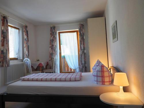 Letto o letti in una camera di Landgasthof Zum Schwarzen Grat