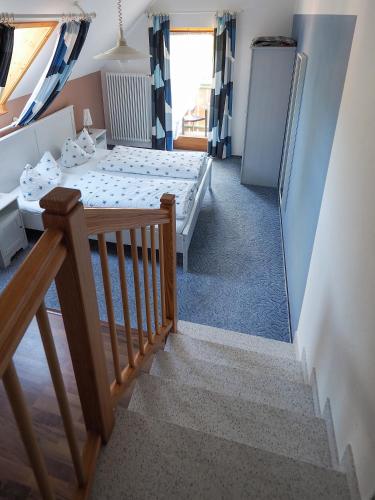 Letto o letti in una camera di Landgasthof Zum Schwarzen Grat