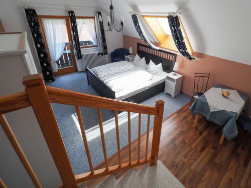 Letto o letti in una camera di Landgasthof Zum Schwarzen Grat