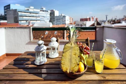 a pineapple sitting on a table on top of a roof at Amadora Terrace View in Amadora