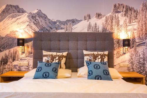 Bachgut - Das Resort am Bergにあるベッド