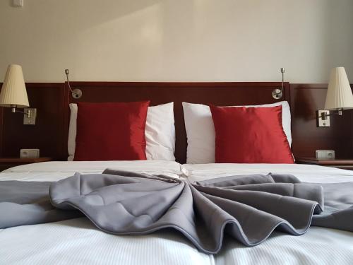 Postel nebo postele na pokoji v ubytování B&B Hotel Praha