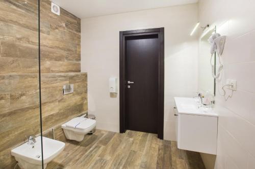 Koupelna v ubytování Girski Hotel&Spa