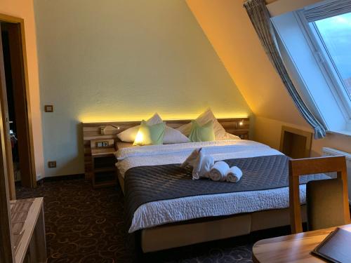 Postel nebo postele na pokoji v ubytování Hotel Seemeile