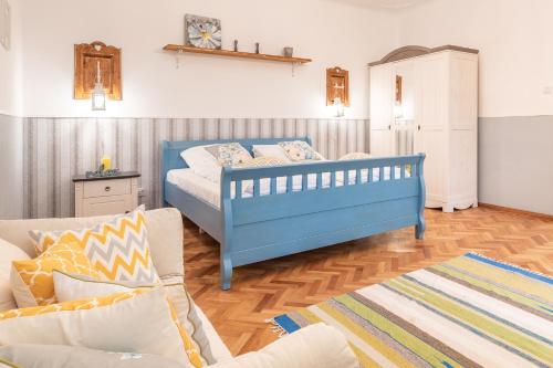 A bed or beds in a room at BonTon Apartments Sibiu