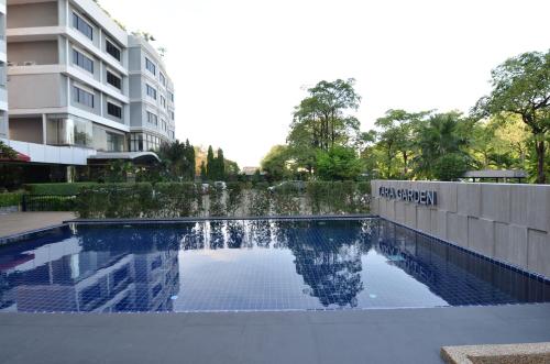 Πισίνα στο ή κοντά στο Grand Tara Garden Thai Hotel