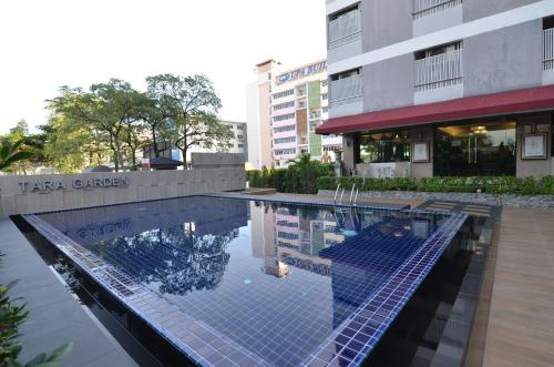 Πισίνα στο ή κοντά στο Grand Tara Garden Thai Hotel