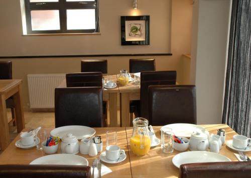 Część wypoczynkowa w obiekcie Homestay Hotel Heathrow