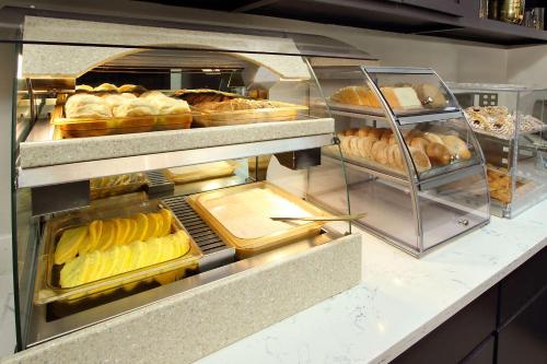 a bakery with many different types of pastries at Hotel Ylem in Houston
