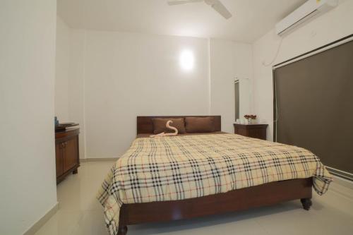 Cama o camas de una habitación en Acons Palm Beach