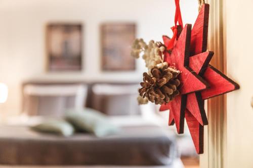 a christmas bow is hanging on a door at Relais Della Porta in Naples