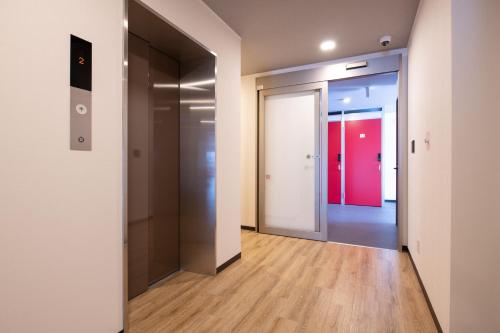 an empty corridor of an office with at Hirafu Tomten in Kutchan