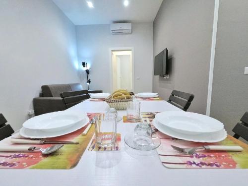 Μια τηλεόραση ή/και κέντρο ψυχαγωγίας στο B&B Aurelia Garden Rooms