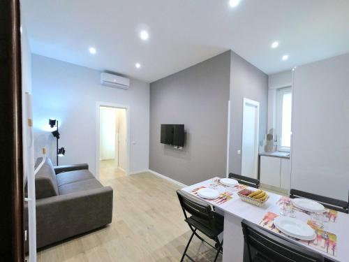 Μια τηλεόραση ή/και κέντρο ψυχαγωγίας στο B&B Aurelia Garden Rooms