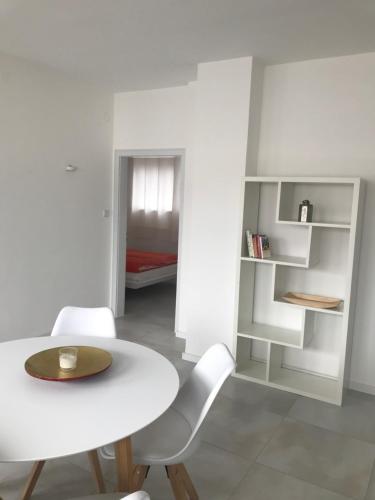 Ένα ή περισσότερα κρεβάτια σε δωμάτιο στο City Loft