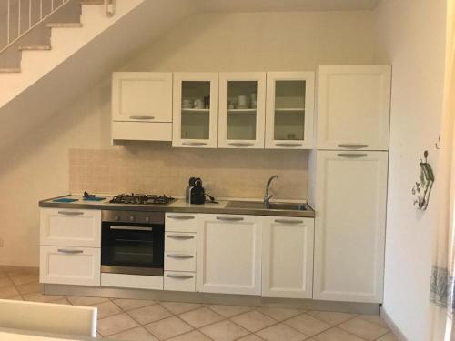 Kuchyň nebo kuchyňský kout v ubytování Residence Arruli