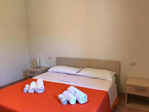 Postel nebo postele na pokoji v ubytování Residence Arruli
