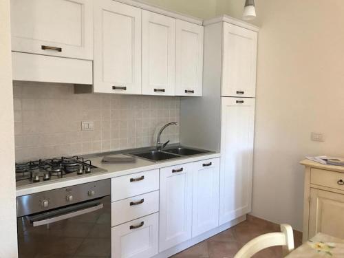 Kuchyň nebo kuchyňský kout v ubytování Residence Arruli