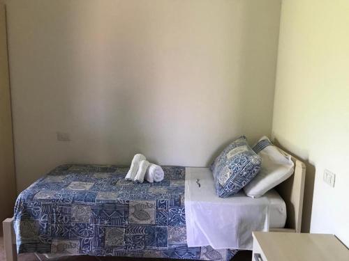 Postel nebo postele na pokoji v ubytování Residence Arruli