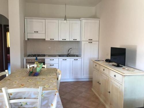 Kuchyň nebo kuchyňský kout v ubytování Residence Arruli