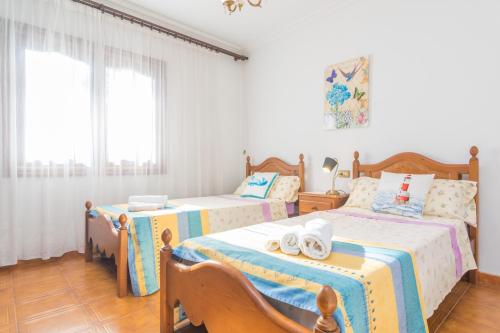 Ένα ή περισσότερα κρεβάτια σε δωμάτιο στο Los Geranios